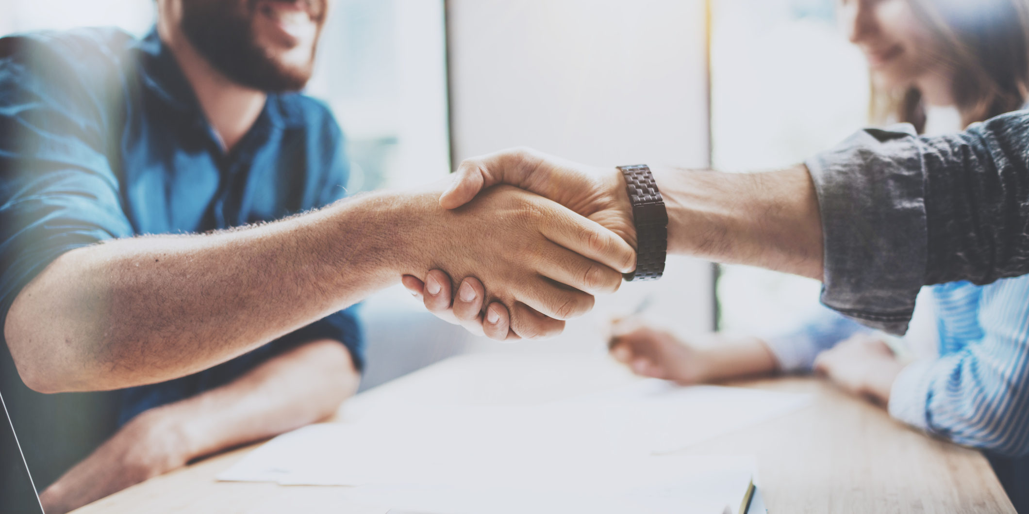 business-male-partnership-handshake-concept-photo-two-mans-handshaking-process-successful-deal-after-great-meeting-100084924